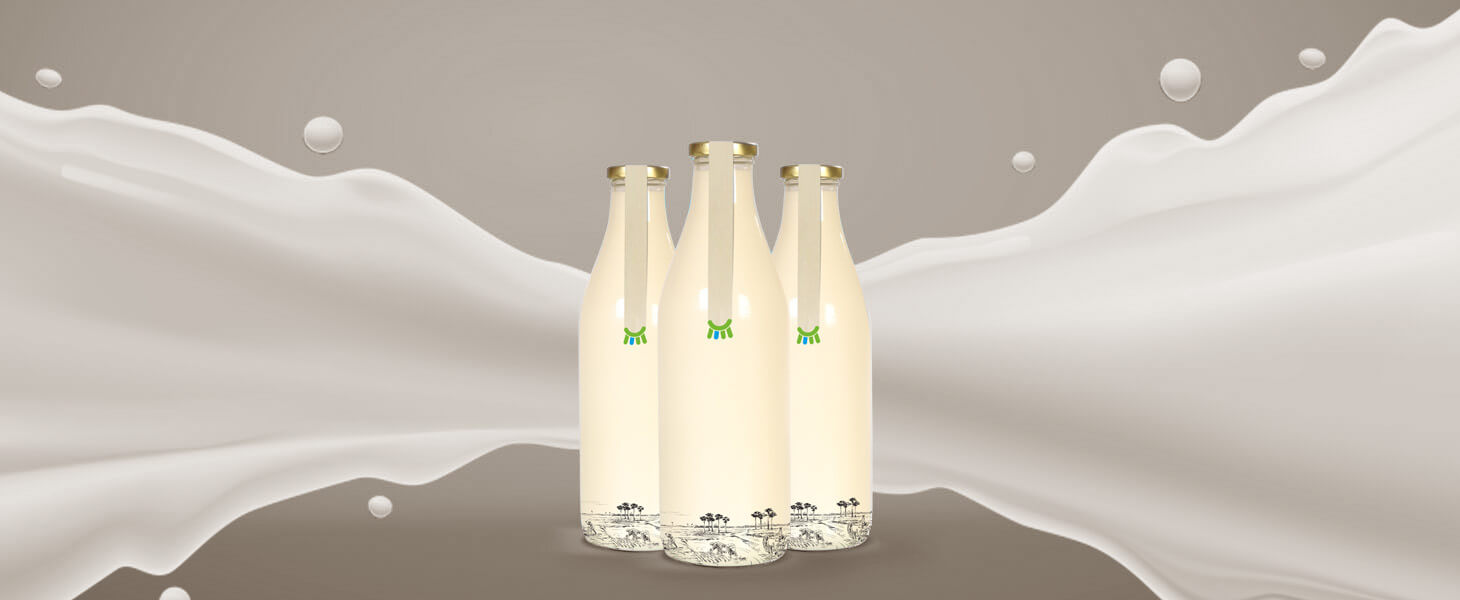 Untouched, chemical-free warm A2 milk in a glass bottle delivered at your doorstep everyday